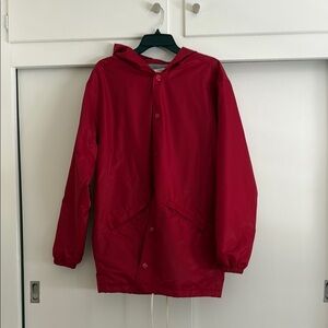 Fear of God red long hooded windbreaker with clasp buttons